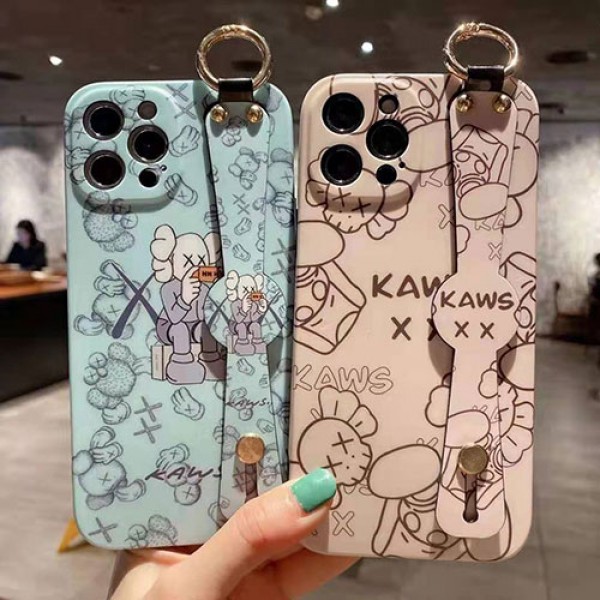 カウズ ブランドiphone12/12pro max/12 mini/12 pro maxケース ハンドバンド付き 韓国風 ホルダー付 KAWS 個性潮 iphone x/xr/xs/xs maxケース 落下防止 ファッション ins風 iphone 11/11 pro/11 pro maxケース かわいい iphone x/8/7 plusケース大人気