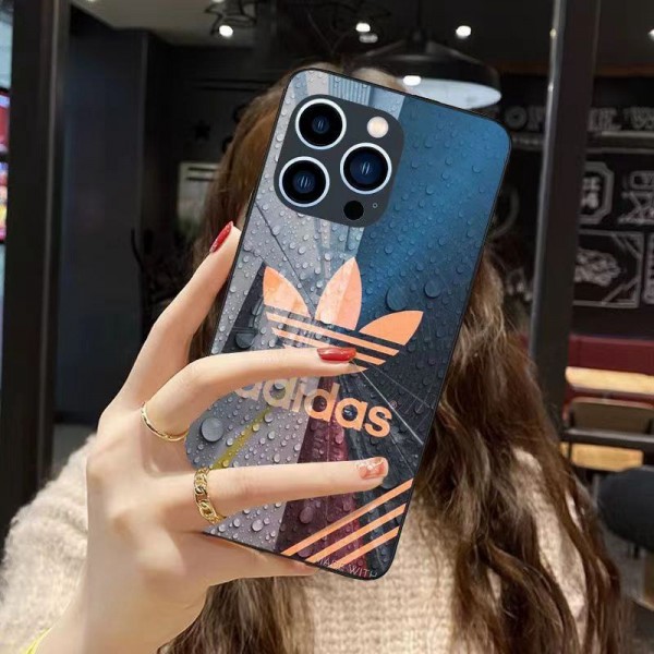 Adidas アディダスブランドiphone 14 plus 15 pro maxケースiphone 14 15 plusケースカバースタンド付き韓国風セレブ愛用 iphone 15 アイフォン 15 14 13pro maxケース ジャケットスマホケース コピーセレブ愛用全機種対応ハイブランドケース パロディ