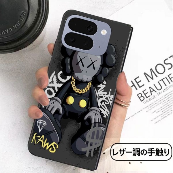 Kaws カウズブランドgalaxy z flip 8 7 6 5 4 fold5 6 7 8 2026ケース グーグル ピクセルPro 11 10 9 foldケースカバースタンド付き韓国風セレブ愛用 iPhone ultra fold 2026ケース ジャケットスマホケース コピーgalaxy z fold 8 7 6 5 4 3スマホケース コピー