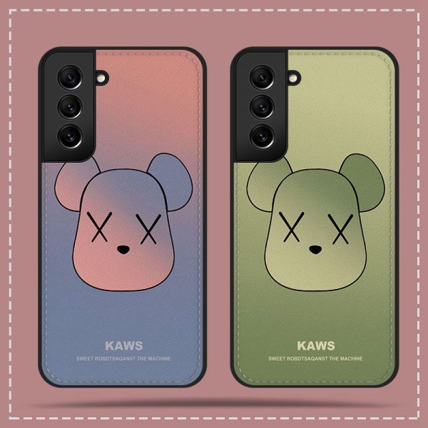 Kaws カウズハイブランド アイフォン16 14 15+ ギャラクシー s24 ultra s23 plus レディースメンズ激安samsung s22 s23 ultra s24ケースカバースタンド付き韓国風セレブ愛用 ギャラクシー s24 s23 ultra アイフォン 15 14 pro maxケース ジャケットスマホケース コピーセレブ愛用全機種対応ハイブランドケース パロディ