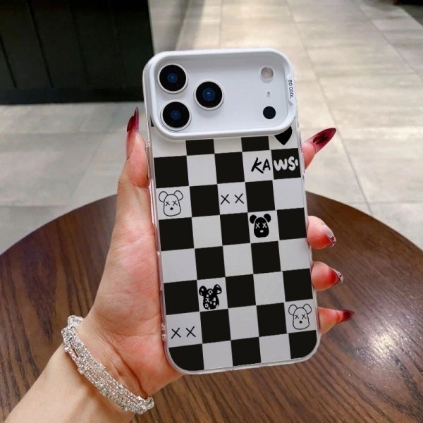 Kaws カウズブランドiphone 16 17 pro 15 plus 16 pro maxケースおしゃれiphone 17 air 16  pro max 15 14 13 12 ケース iphone 17Pro/16/14 pro/15 pro max 16 plus カバー ストラップ付 カード入れ韓国風セレブ愛用 iphone 16 15 17 air アイフォン17 16 15 14 13pro maxケース ジャケットスマホケース コピー