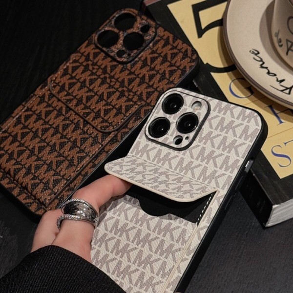 マイケルコース MK ブランドiphone 16 17 pro 15 plus 16 pro max 17eケースハイブランド アイフォンair 16 plus 15 14+ 16 17pro max カバーレディースメンズ激安iphone16 17 pro air 14 15 16 plus 17ケースカバースタンド付きセレブ愛用全機種対応ハイブランドケース パロディ