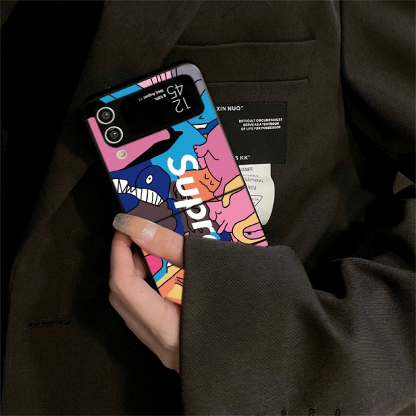 Supreme シュプリームブランドgalaxy z flip 7 6 5 4 flip5 6 7 2026ケース折り畳み可ギャラクシー z flip 7 6 5 4 3ケース 革製galaxy fold 7 6 5 4 3 2ケースカバースタンド付きセレブ愛用全機種対応ハイブランドケース パロディ